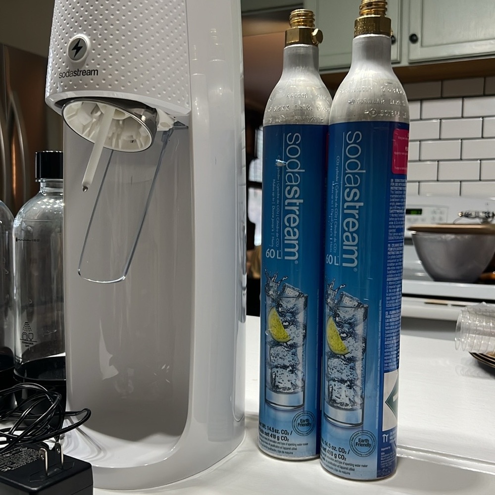Soda Stream - used  but in excellent condition  (3) bottles + 2 CO2 canisters